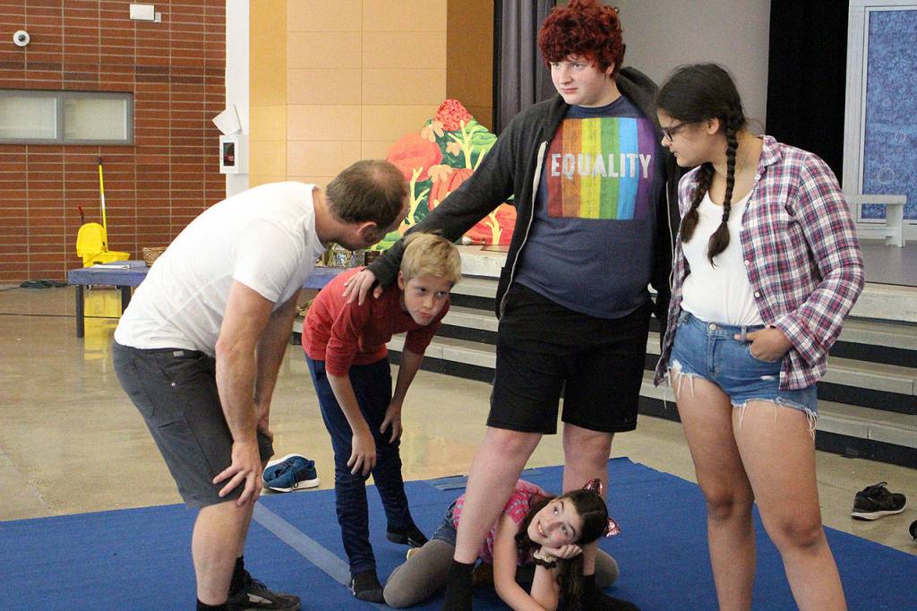 SANCA Seattle choreographer, Mick Holsbeke, helps the cast members of The Monkey King perfect their movements. From left Mick Holsbeke, Julian Podzilni, Nora Jorgensen, Sam Lamperti, and Abby Gamache. Madison Miller / staff photo
