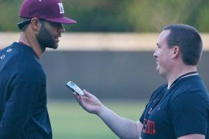 Sound Publishing sportswriter Shaun Scott, right, interviews Dominic Woody following a game against the Interlake Saints in April of 2019. Scott will be leaving Sound Publishing after 59 months on the job. Photo courtesy of Jim Nicholson