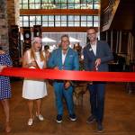 The ribbon cutting for Aegis Living took place in Mercer Island on July 20. Left to right: Mary Van Orman, Terese Clark, Dwayne Clark, Phil Clough and Stephanie Bayne. Photo courtesy of Aegis Living.                                 Aegis Living is a 100,000 square foot building with 89 apartment homes. Photo courtesy of Aegis Living.