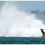 J. Michael Kelly, driver of the U-12 Graham Trucking winner at the 69th annual HomeStreet Bank Cup at Seafair. His boat is also pictured. Photos courtesy of Owen Blauman and Chris Denslow