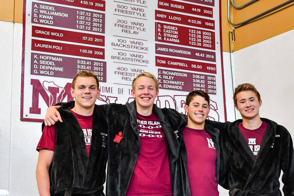 Six Islanders honored as high school All-American swimmers