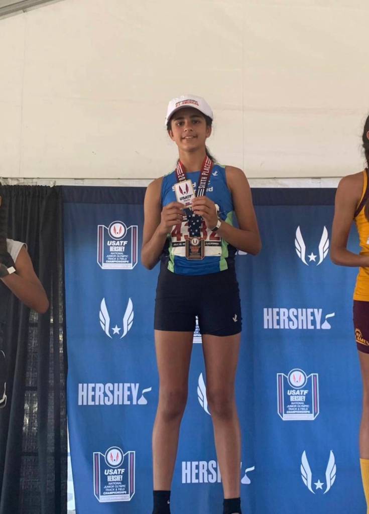 Aaliyah Khan stands on the podium at the championships in Sacramento, California. Courtesy photo