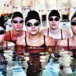 Chauntelle Johnson returns as head coach for the Mercer Island High School girls swim and dive team this season. Johnson was head coach for both the MIHS girls and boys teams several years ago when she helped the girls team to five state titles and the boys team to three state titles. The girls captains this year are (pictured): Ellie Bailey, Kate Hamilton, Grace Olsen and Hailey Vandenbosch for swim, and Sophie McGuffin for the diving group. Photo courtesy of Allison Nelson
