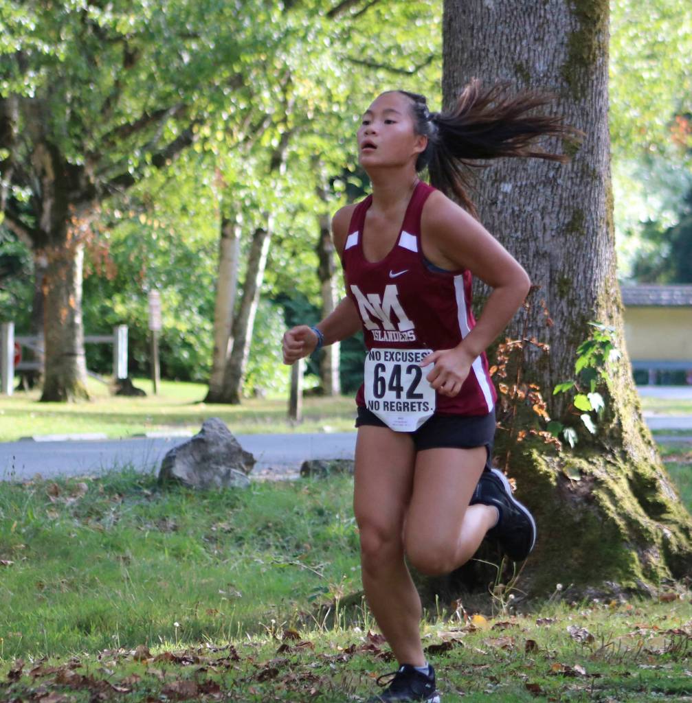 Mercer Island cross-country sophomore runner Erin Eng-Mullen competes at the KingCo Jamboree Class Race at Lake Sammamish State Park on Sept. 11. Benjamin Olson/ staff photo
