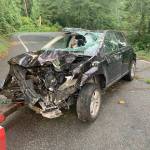 The driver, a 41-year-old woman, was found in her car with minor injuries. Her car was down a ravine, about 65 feet from the road. Photo courtesy of Mercer Island Police Department