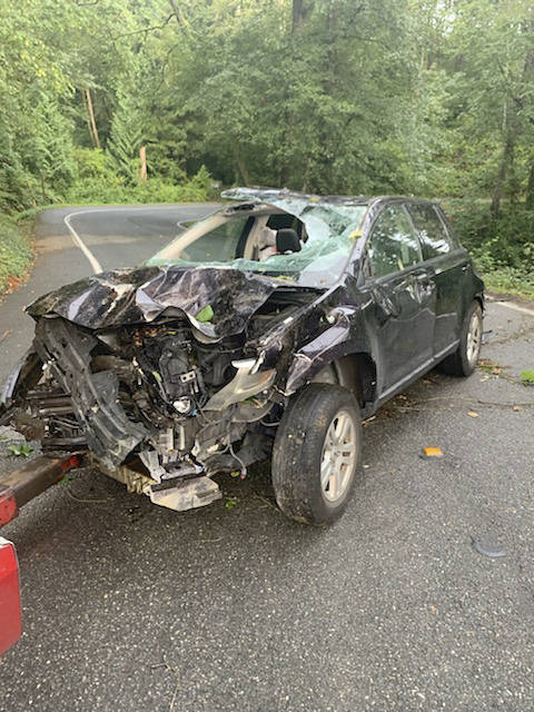 The driver, a 41-year-old woman, was found in her car with minor injuries. Her car was down a ravine, about 65 feet from the road. Photo courtesy of Mercer Island Police Department
