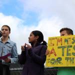 Photo by Madison Miller / staff photo                                Islander Middle School students Rebecca de Broglio and Rhett Hounsell, among others, speak before IMS students at Fridays climate strike.