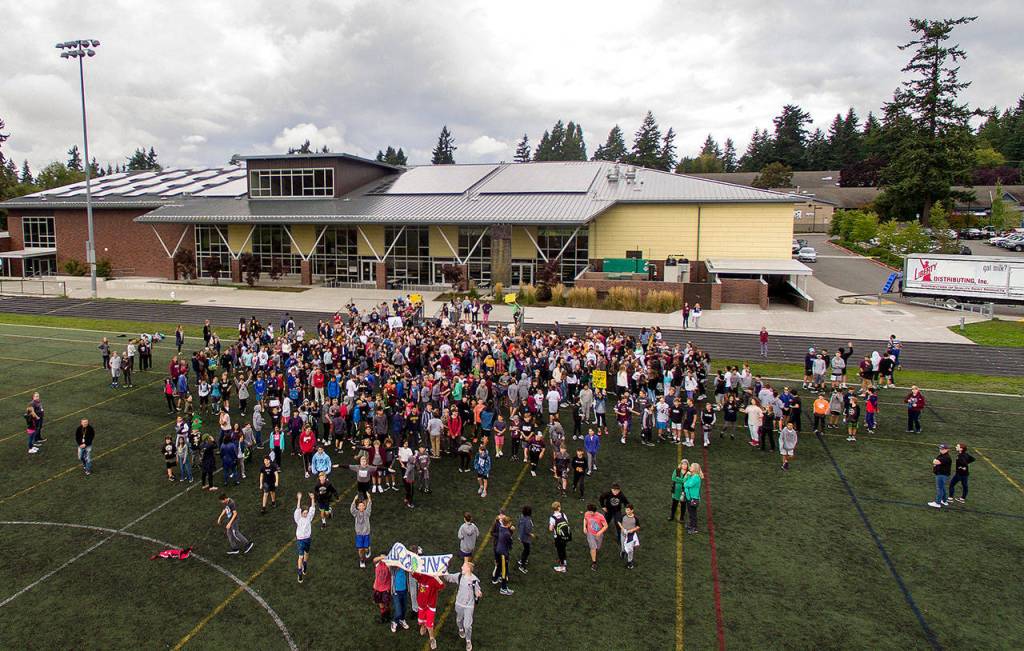 IMS students walked out in waves at 10 a.m. on Friday morning to symbolize the approximate 10 years the planet has to address climate change. Photo courtesy of Rebecca de Broglio