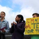 Photo by Madison Miller / staff photo                                Islander Middle School students Rebecca de Broglio and Rhett Hounsell, among others, speak before IMS students at Fridays climate strike.