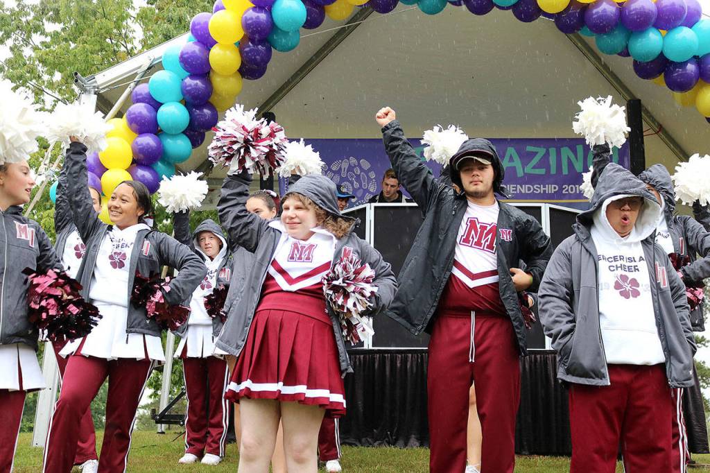 Mercer Islands Sparks Squad led participants in a pre-walk hype at Luther Bank Park on Sept. 22. Stephanie Quiroz/staff photo