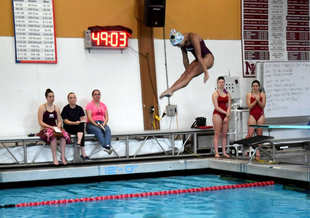 Mercer Island senior Sophie McGuffin dives during the Islanders victory over Sammamish on Oct. 3. Photo courtesy of Allison Nelson