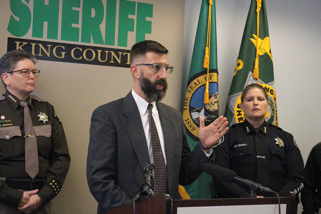 Public Health of Seattle-King County strategic advisor, Brad Finegood, discusses the dangers of fentanyl at Wednesdays news conference following the deaths of two Sammamish teens. Left: King County Sheriff Mitzi G. Johanknecht, Brad Finegood and Sammamish Police Chief Michelle Bennett. Madison Miller /staff photo