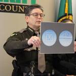 Madison Miller / staff photo                                King County Sheriff Mitzi G. Johanknecht shows what M30 pills look like at a news conference Wednesday.