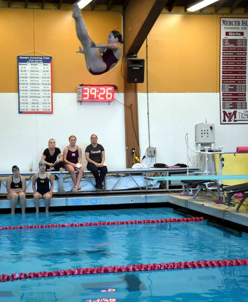 Mercer Island freshman Brooke Andrews dives into the pool during a meet against Bellevue at Mary Wayte Pool on Oct. 10. Photo courtesy of Allison Nelson