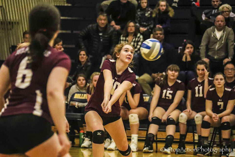 Mercer Island outside hitter Anna Perry (10) hits the ball during the Islanders 3-2 victory over Bellevue on Oct. 30. Photo courtesy of Don Borin/Stop Action Photography