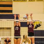 Mercer Island seniors Anika Iverson (17) and Quinn Casey (12) jump to block a shot in a 3-2 victory over Bellevue on Oct. 30. Photo courtesy of Don Borin/Stop Action Photography