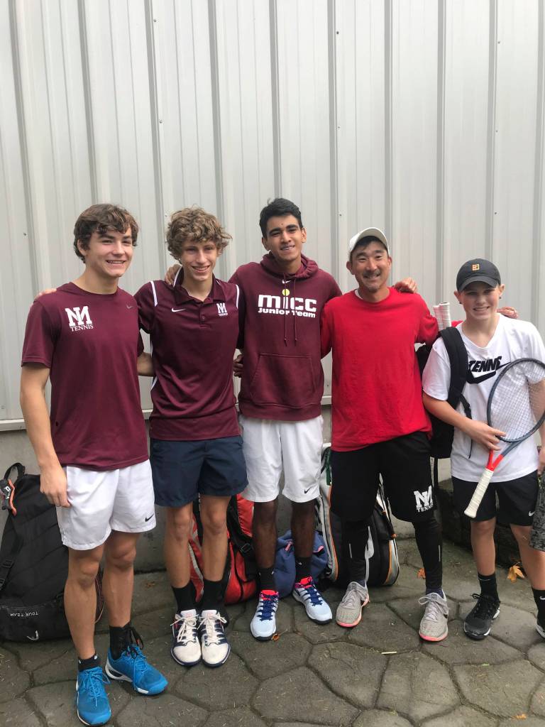 Members of the Mercer Island boys tennis team, (from left) Jack Mattox, Andrew Kaelin, Alex Patel, head coach Ryan Pang and Brock Anderson, gather at the 3A KingCo league tournament. Photo courtesy of Steve Mattox
