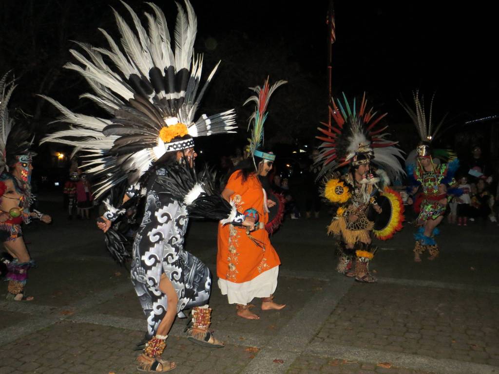 Traditional dancers perform at the Dia De Los Muertos celebration in downtown Issaquah. Samantha Pak/staff photo