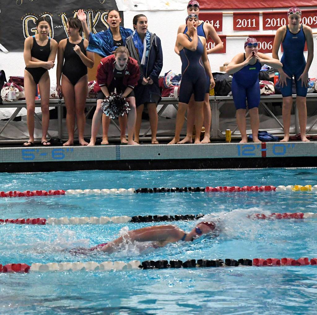 Mercer Island swimmer Cayla Prophater competes in the 200 free while being cheered on by teammates at the district meet on Nov. 9. Photo courtesy of Allison Nelson