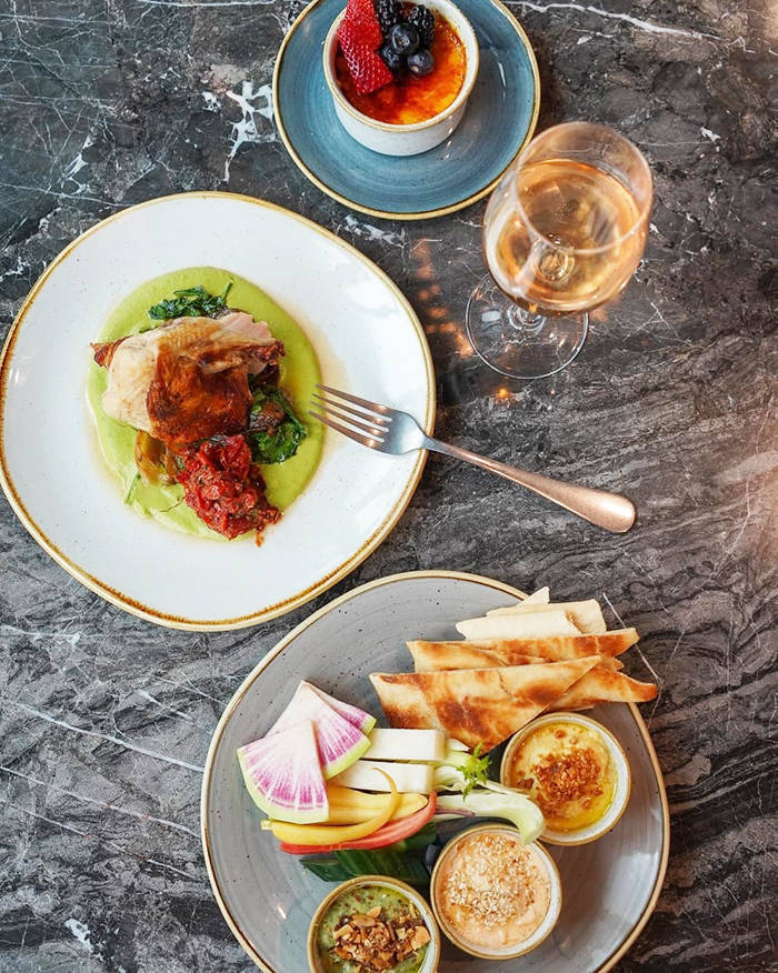 Whether youre sitting down to a full meal or meeting friends for an after work drink and appetizer, the Fork and Spoke restaurant in the Hilton Garden Inn Redmond Town Center will aim to offer you an enjoyable experience. The hotel and restaurant are slated to open in February 2020.