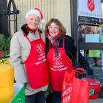 Courtesy photo                                 Mercer Island Rotary Club members Bruce McAuley and Karolyn Streck volunteering as bell ringers for the Salvation Army.