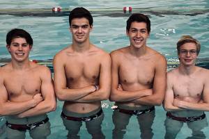 Boys swim and dive team makes a splash in victory over Bellevue