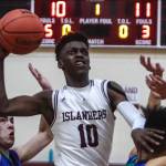 Boys basketball cruises past Liberty, girls pick up their first win of the season | Mercer Island prep basketball recap