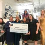 At a Dec. 6 event, Pitch Your Peers (PYP) Seattle presented a grant award of $17,700 to Kindering. From left: Kindering community engagement officer Anna Brown, Kindering chief development officer Alison Morton, PYP grant champion  who pitched Kindering  Erin Azose, Kindering CEO Lisa Greenwald, PYP co-founder and president Erin Krawiec, Kindering assistant development director Jennifer Schumacher, and PYP co-founder and vice president Alison Burks. Courtesy photo.