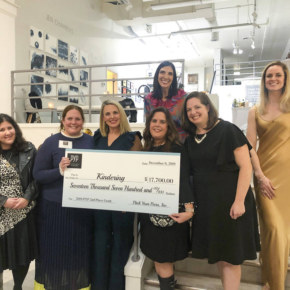 At a Dec. 6 event, Pitch Your Peers (PYP) Seattle presented a grant award of $17,700 to Kindering. From left: Kindering community engagement officer Anna Brown, Kindering chief development officer Alison Morton, PYP grant champion  who pitched Kindering  Erin Azose, Kindering CEO Lisa Greenwald, PYP co-founder and president Erin Krawiec, Kindering assistant development director Jennifer Schumacher, and PYP co-founder and vice president Alison Burks. Courtesy photo.