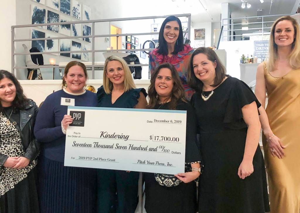 At a Dec. 6 event, Pitch Your Peers (PYP) Seattle presented a grant award of $17,700 to Kindering. From left: Kindering community engagement officer Anna Brown, Kindering chief development officer Alison Morton, PYP grant champion  who pitched Kindering  Erin Azose, Kindering CEO Lisa Greenwald, PYP co-founder and president Erin Krawiec, Kindering assistant development director Jennifer Schumacher, and PYP co-founder and vice president Alison Burks. Courtesy photo.