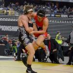 Mercer Island Islanders senior wrestler Donnie Howard, left, battles against Yelms Derrick Platt, right, in the Mat Classic Class 3A 195-pound championship match. Platt earned a 3-2 victory against Howard on Feb. 16 at the Tacoma Dome. Photo courtesy of Billy Pruchno