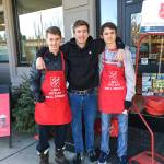 Mercer Island High School Interact Club members participated in bell ringing for Salvation Army with the Rotary Club of Mercer Island in late November and December 2019. From left: Charles Wischman, Peyton Rapo and Mathis Destouches. Courtesy photo.