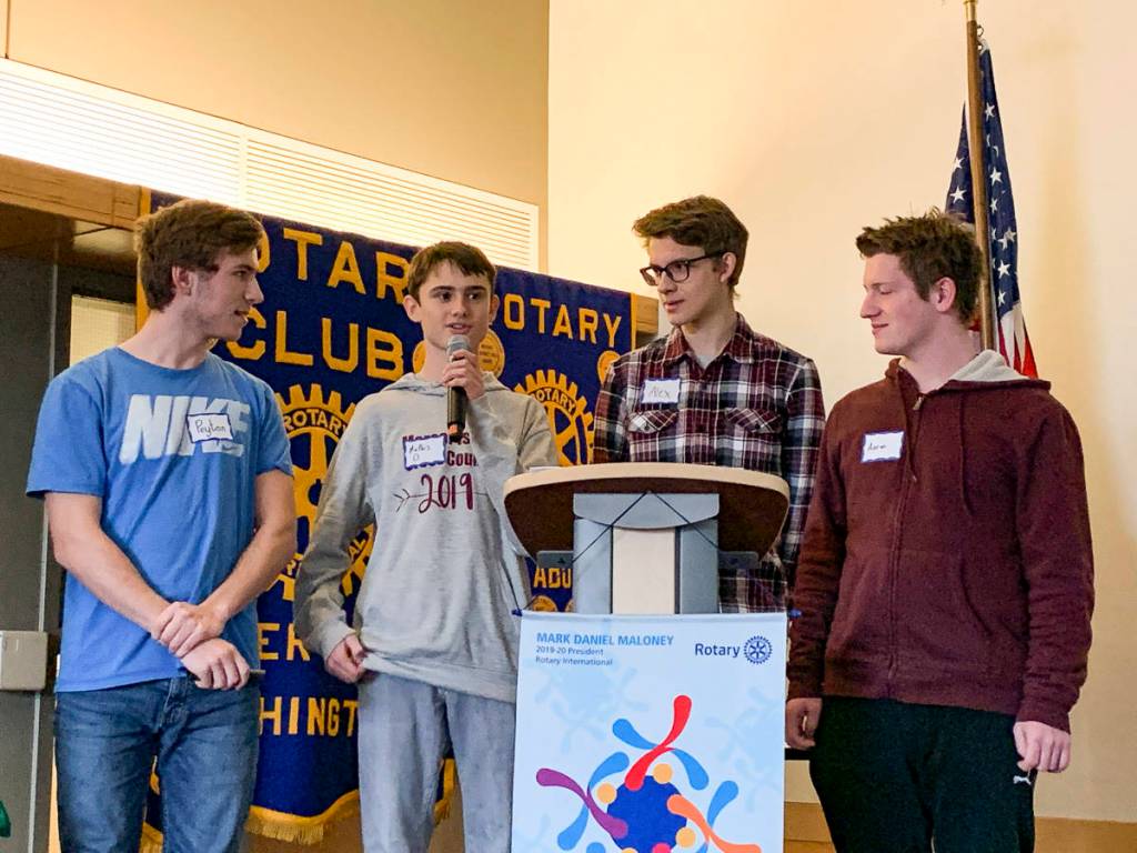 Mercer Island High School Interact club members presented at the Dec. 17 meeting of the Rotary Club of Mercer Island. From left: club president Peyton Rapo, treasurer Mathis Destouches, Alex Castleman and Aaron Kann. Courtesy photo.