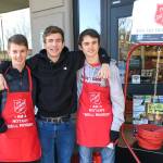 Mercer Island High School Interact Club members participated in bell ringing for Salvation Army with the Rotary Club of Mercer Island in late November and December 2019. From left: Charles Wischman, Peyton Rapo and Mathis Destouches. Courtesy photo.