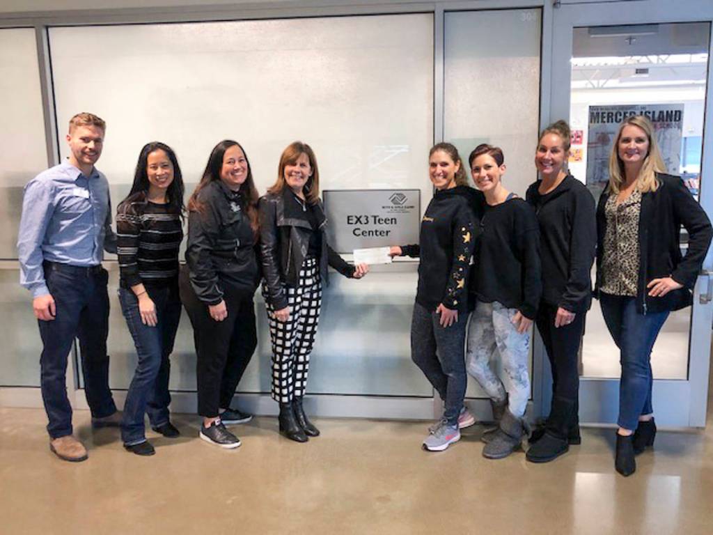 Courtesy photo                                A check for $1,830 ­– funds raised through the Mercer Island Chamber of Commerces second Fitness Crawl – was presented to the Mercer Island Boys Girls Club on Dec. 9. From left: Austin Bergeron (corporate engagement officer, Boys Girls Clubs of King County), Jamie Hsu (Mercer Island Boys Girls Club board president), Becky Shaddle (athletic director at Mercer Island Boys Girls Club), Laurie Black (president CEO of Boys Girls Clubs of King County), Amy Wolff (studio manager at Orangetheory Fitness Mercer Island), Kaelyn Adams (owner/instructor of BarreRev), Ginny Pietila (owner/instructor of Mercer Island Athletic Club), and Laurie Givan (executive director of the Mercer Island Chamber of Commerce).