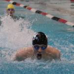Matt Williamson (black cap) is part of a talented group of freshmen swimmers for the Mercer Island boys swim and dive team. Benjamin Olson/staff photo