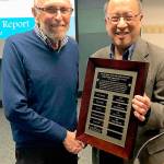 Courtesy photo                                Elliot Newman (left) receives his MIYFS Family Inspirational Award from Mayor Wong on Jan. 7.