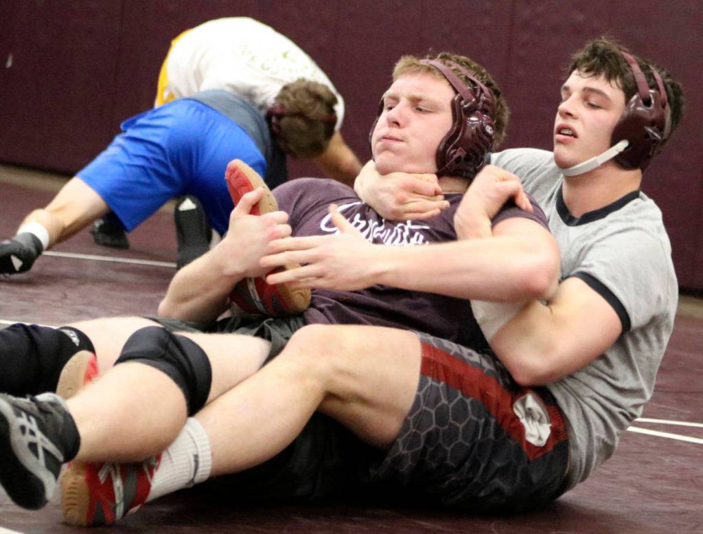 Mercer Islands Owen Baebler (left) and Colin Farrell (right) wrestle at a practice early in the season. Benjamin Olson/staff photo