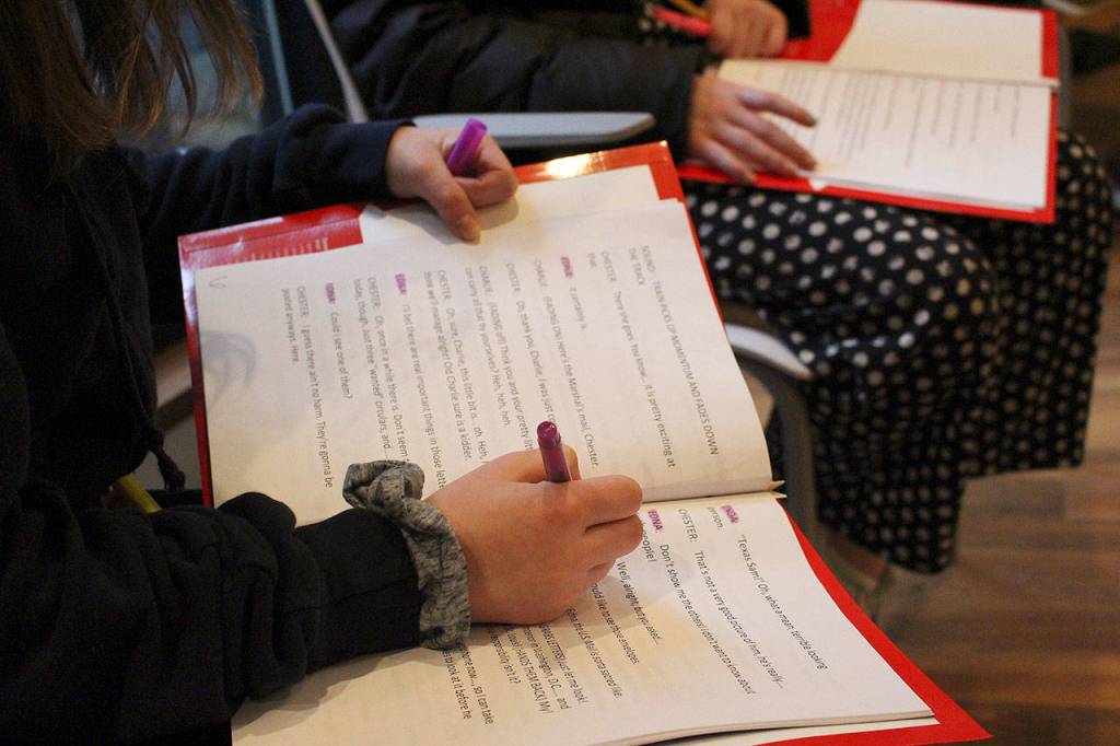 Madison Miller/ staff photo                                YTN students and residents rehearse for their upcoming radio show performance of Gunsmoke.