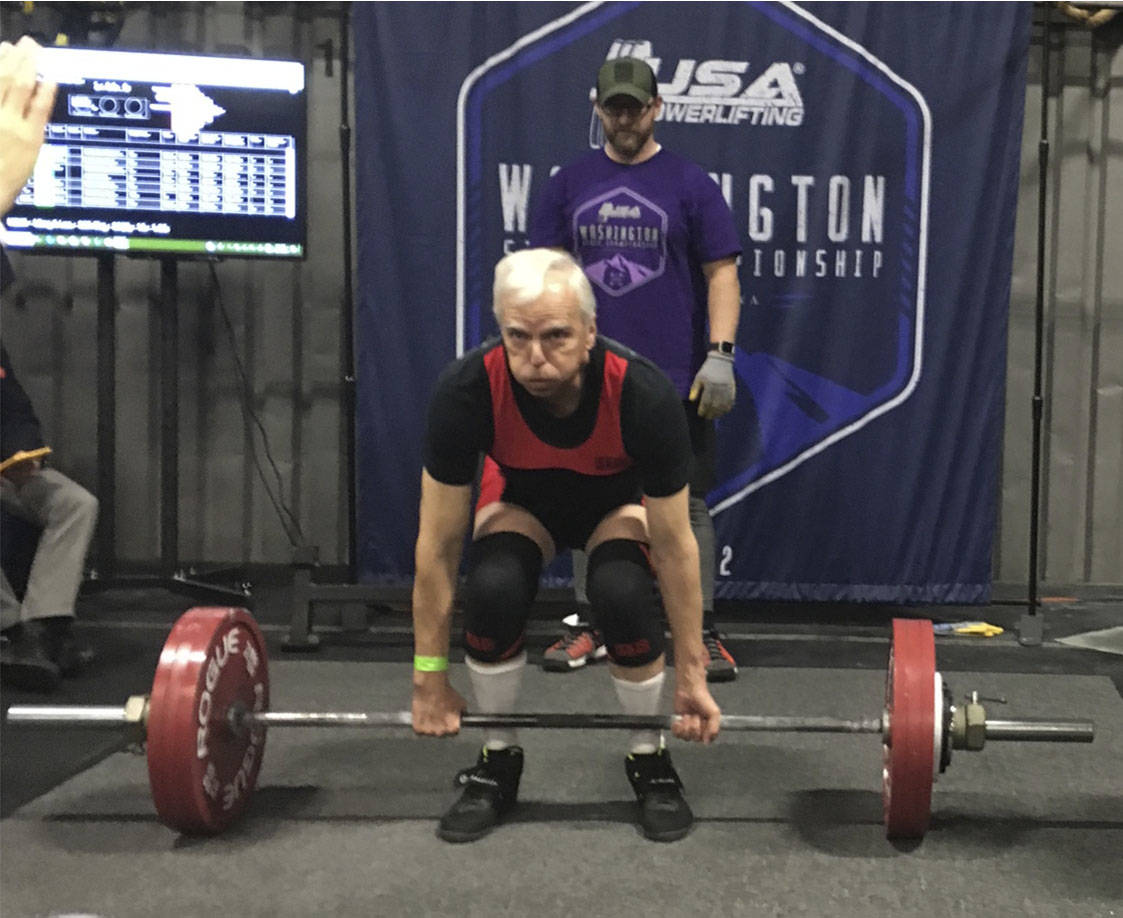 Robert Harper prepares for a deadlift at a powerlifting competition. At nationals, Harper set the American powerlifting records for the squat, deadlift and total combined weight. Courtesy photo