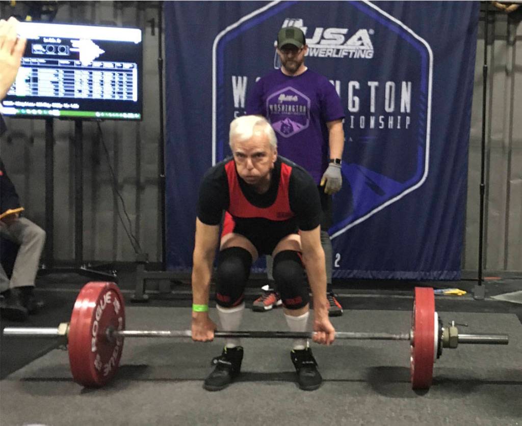 Robert Harper prepares for a deadlift at a powerlifting competition. At nationals, Harper set the American powerlifting records for the squat, deadlift and total combined weight. Courtesy photo