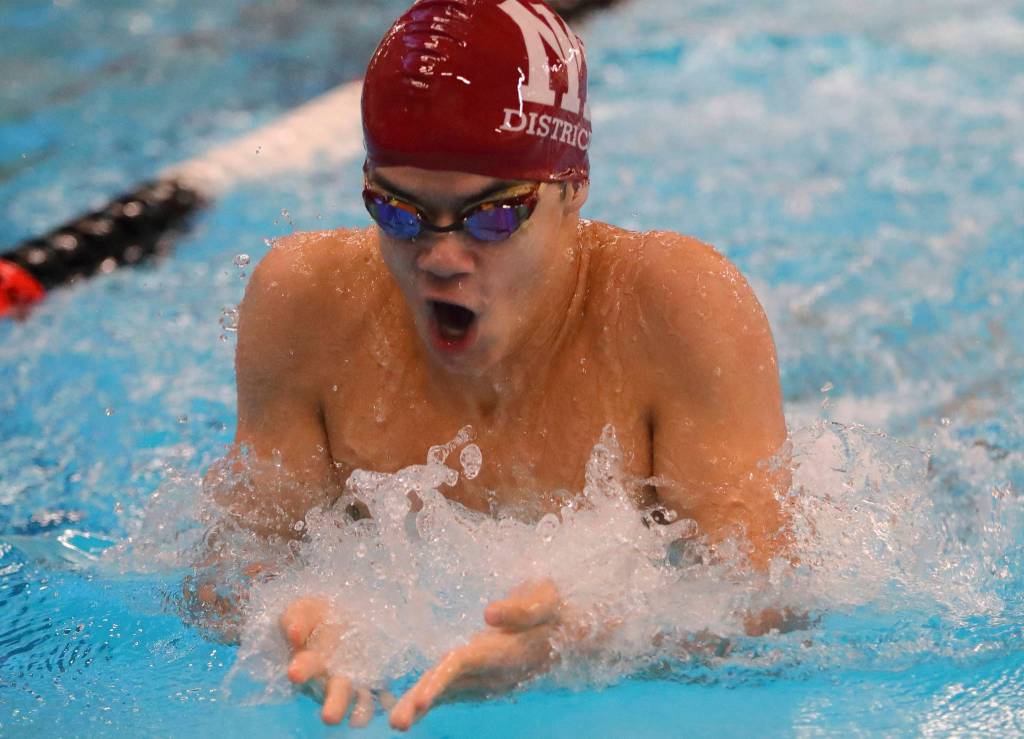 Carter Whipple returned to the pool to compete with the Mercer Island swim and dive team for the first time on Jan. 30 after being diagnosed with POTS. Here, he swims at a previous meet. Photo courtesy of Jim Jantos