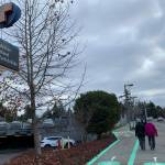Natalie DeFord / staff photo                                People walk past the Mercer Island Park and Ride on a cloudy morning.