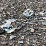 Thick chunks of broken glass in the parking area of the East Seattle Elementary School property. Natalie DeFord/staff photo