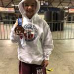 Lincoln Woods (Mercer Island) placed in eighth in the 102-pound, under-14 division at the state folkstyle wrestling championships on Feb. 23 at the Tacoma Dome. Courtesy photo