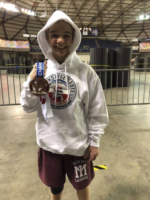 Lincoln Woods (Mercer Island) placed in eighth in the 102-pound, under-14 division at the state folkstyle wrestling championships on Feb. 23 at the Tacoma Dome. Courtesy photo