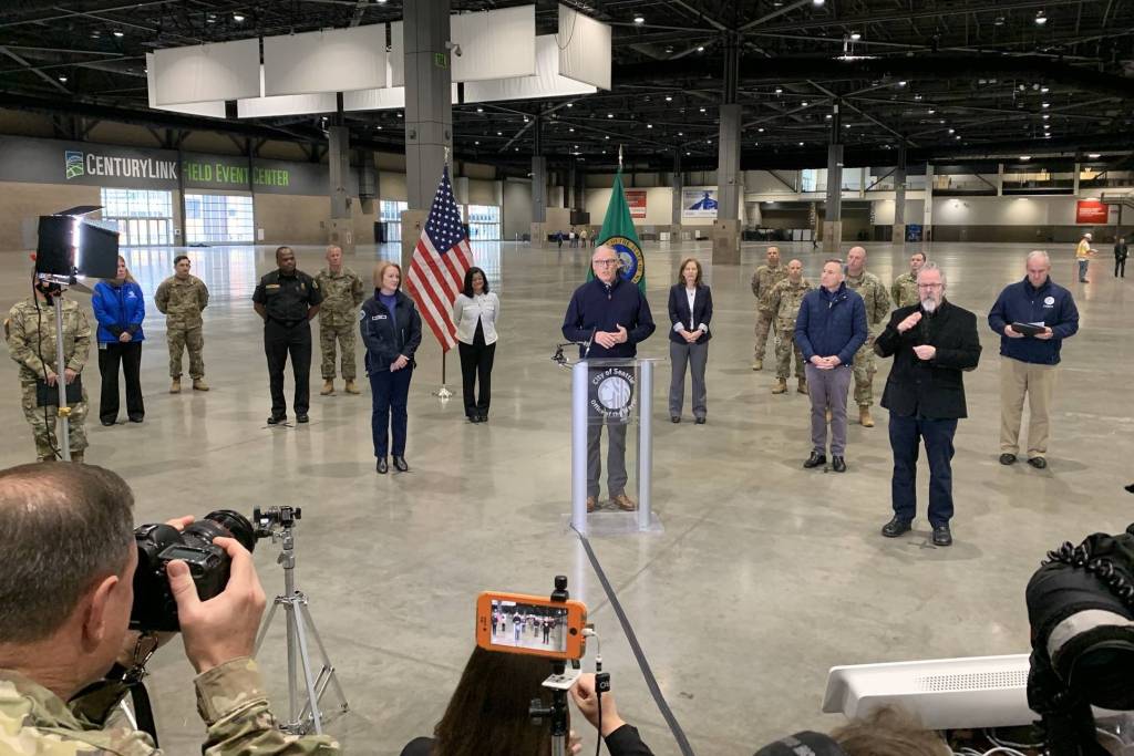 Gov. Jay Inslee is pictured March 28 at a field hospital set up at the CenturyLink Field Event Center to address non-COVID-19 medical needs. (Photo courtesy of Jay Inslees Twitter feed)