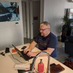 Point Inside CEO Jon Croy at his at-home work station. Photo courtesy of Point Inside