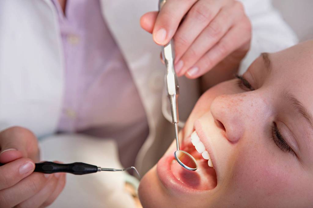 Dentist checking patients teeth. Sound Publishing file photo