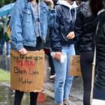 Protestors at the intersection of Island Crest Way and Southeast 40th Street. Blake Peterson/staff photo